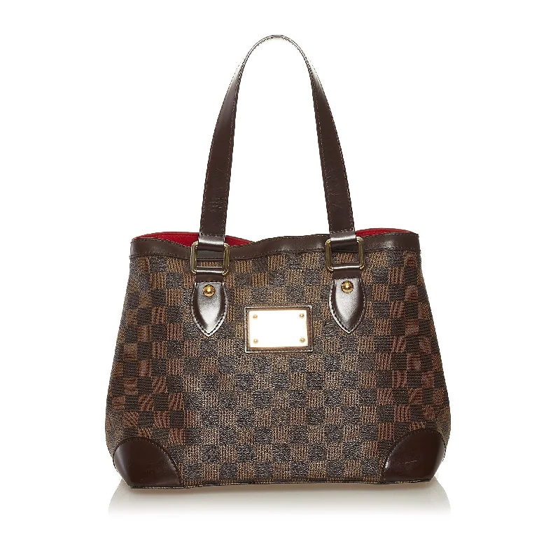 Louis Vuitton crossbody bags with a woven leather strap for textureLouis Vuitton Hampstead PM Damier Ebene Canvas