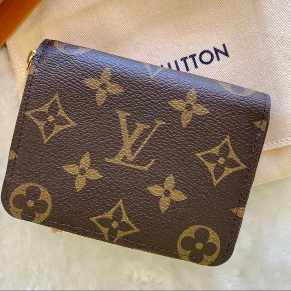 Louis Vuitton Alma bags with a monogram - embossed leather surfaceLOUIS VUITTON Japanese edition zippy coin purse