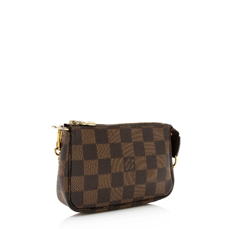 Louis Vuitton Twist bags with a snakeskin - effect panel for a bold lookLouis Vuitton Damier Ebene Mini Pochette Accessoires (22540)