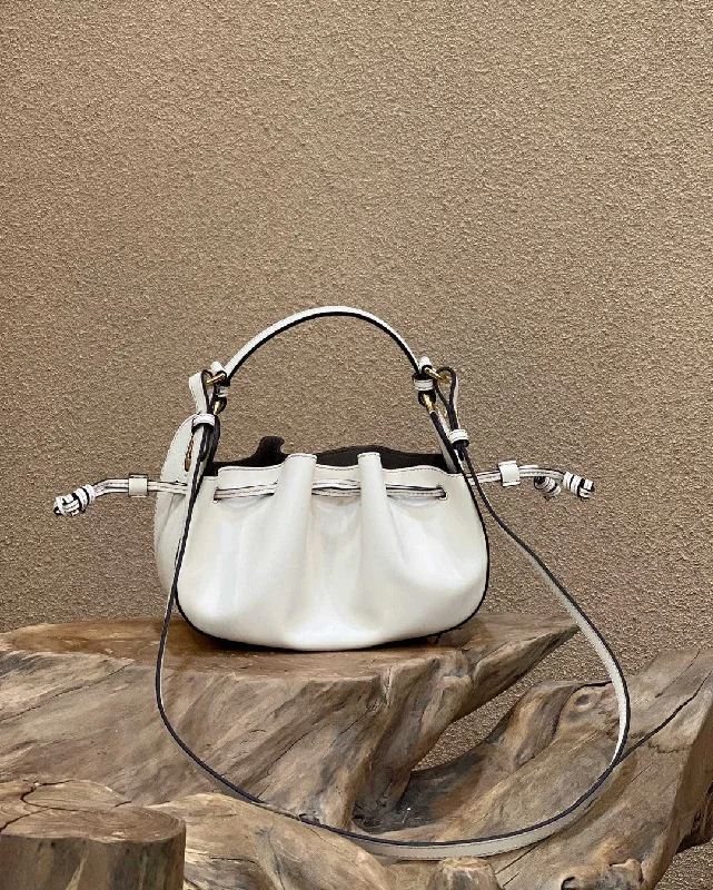 Fendi Baguette bags with a detachable charm featuring the brand's mascotFendi Pomodorino White Mini Bag