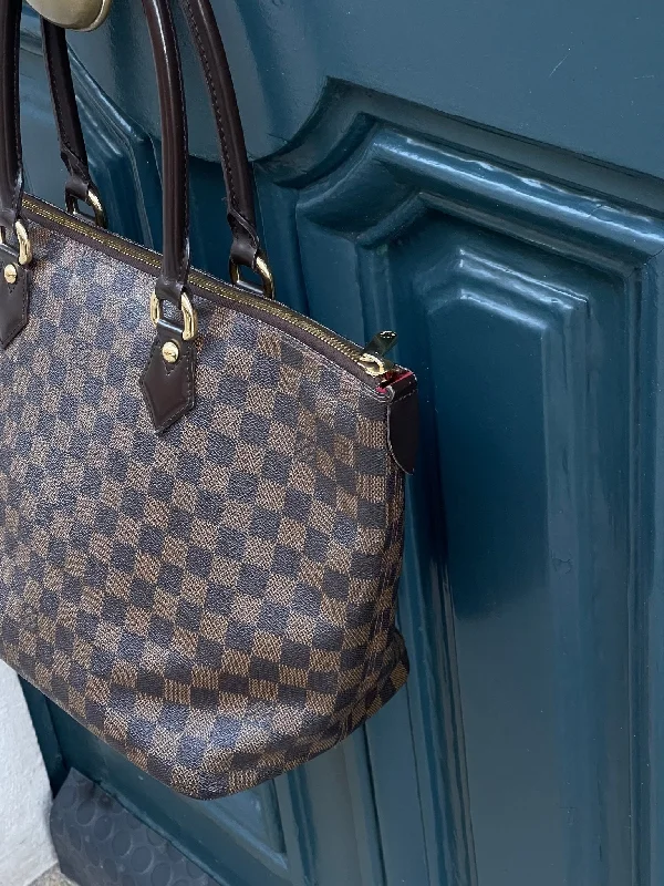 Ladies Louis Vuitton Capucines bags with gold - toned hardwareLouis Vuitton - cabas saleya damier ébène