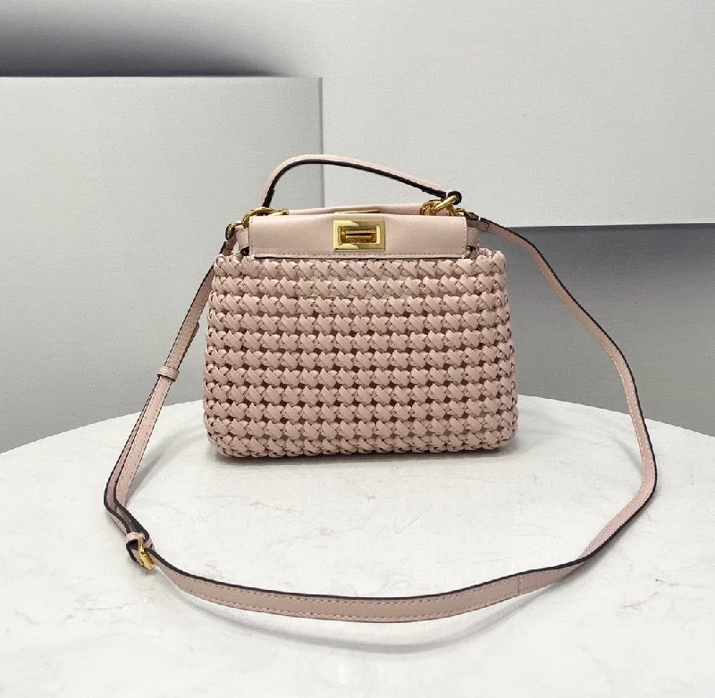 Fendi bags with a zippered interior pocket for separating items and keeping them organizedFendi Peekaboo Mini Pale Pink Braided Bag