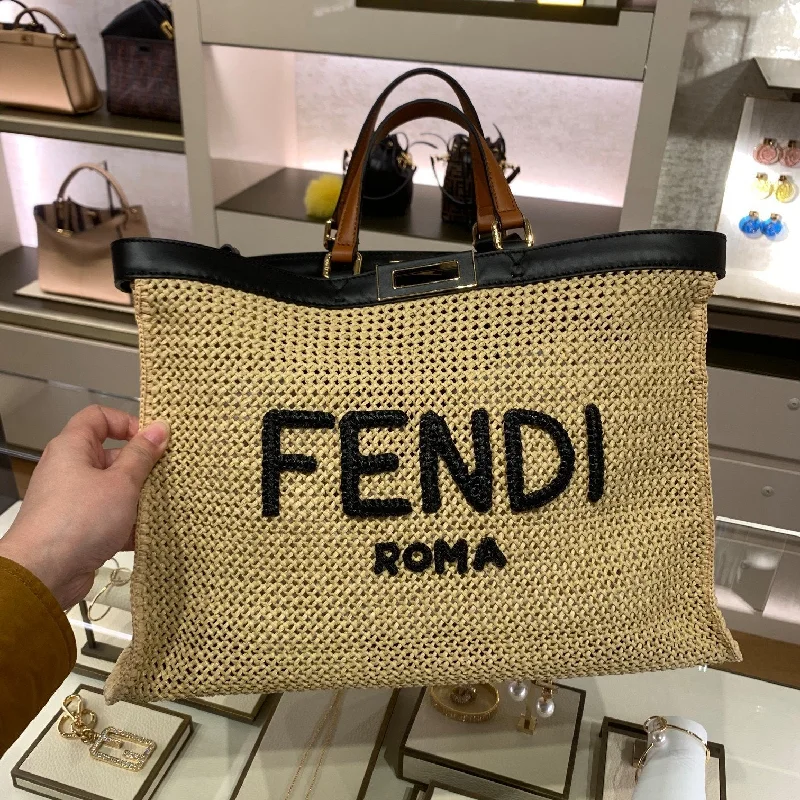 Fendi tote bags with a hand - painted FF pattern for an artisanal and one - of - a - kind touchFendi Peekaboo X-tote Medium Woven Straw Tote Bag