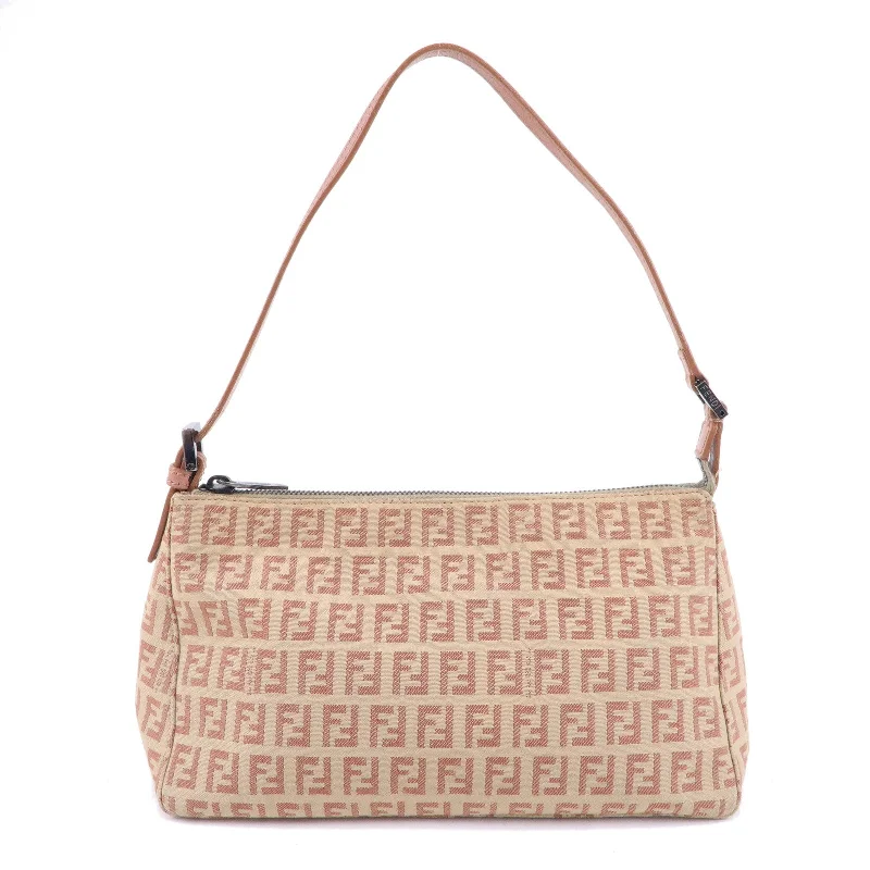 Fendi Baguette bags with a studded leather trim for a bold and edgy lookFENDI Zucchino Canvas Leather Shoulder Bag Beige Pink 8BR267