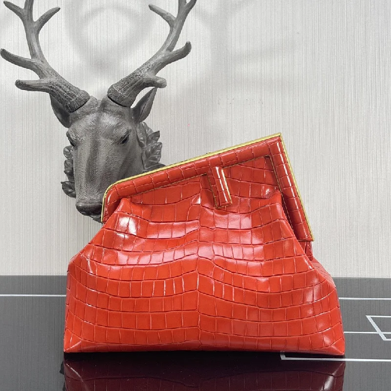 Fendi Baguette bags featuring the iconic FF logo plaque for a branded lookFendi Fendirst Medium Orange Crocodile Bag For Woman 32.5cm/13in