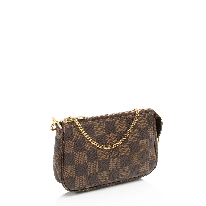 Louis Vuitton Alma bags featuring the signature top - handle designLouis Vuitton Damier Ebene Mini Pochette Accessoires (pidasH)