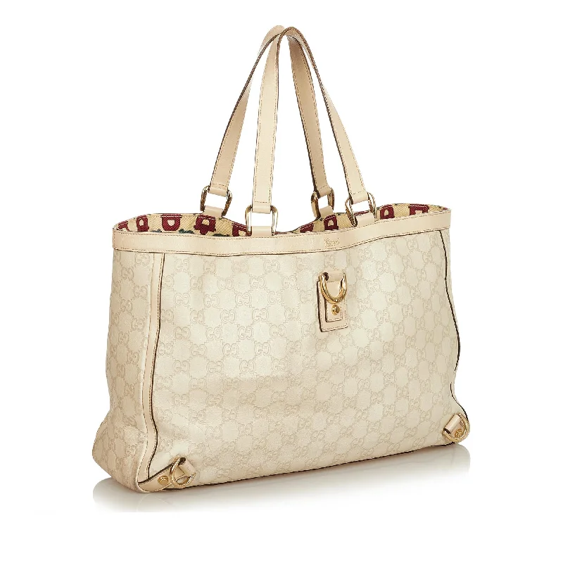 Women Gucci bags with a chain - link trim and a leather bodyGucci Guccissima Abbey D-Ring Tote Bag (31868)